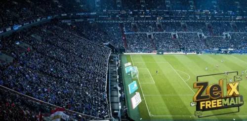 soccer players on green game field