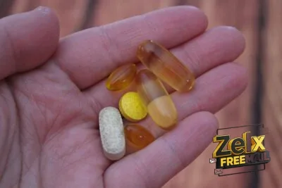 person holding medication pills