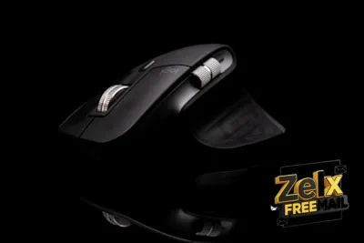 a computer mouse sitting on top of a black surface