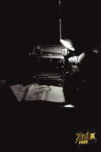A black and white photo of an old typewriter