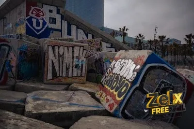 a bunch of graffiti on the side of a building