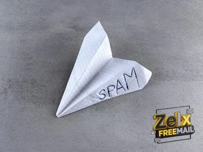 a paper airplane with the word spam written on it