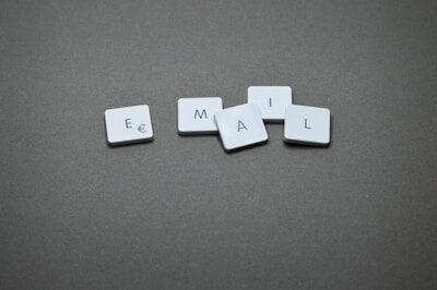 The word "email" is spelled out with letter tiles
